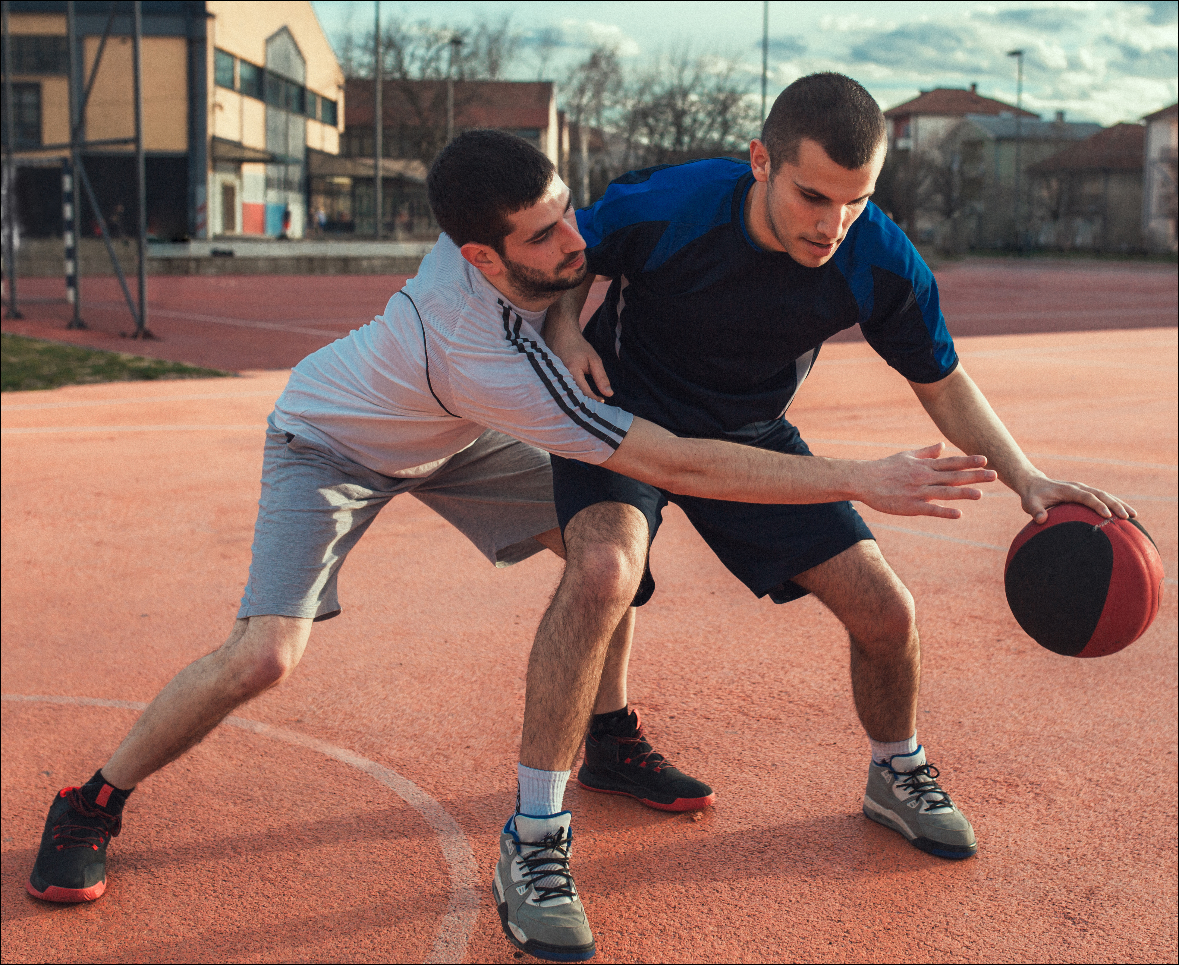 Two Basketball Players Playing Basketball Discovery Eye Foundation