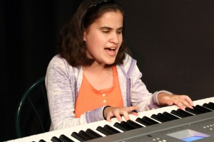 Caitlin at piano - blind actress