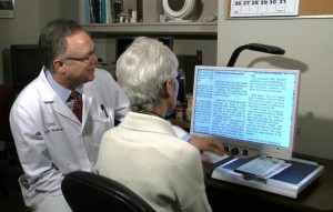 Patient working with a low vision therapist